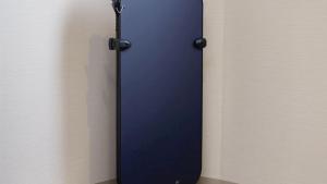 a blue door in the corner of a room at Hotel Wing International Premium Osaka-Shinsekai in Osaka