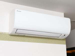 a white television sitting on top of a counter at Hotel Wing International Premium Osaka-Shinsekai in Osaka