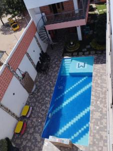 Bazén v ubytování FÁTIMA REAL nebo v jeho okolí