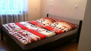 Łóżko lub łóżka w pokoju w obiekcie Pokoje Gościnne Saritas