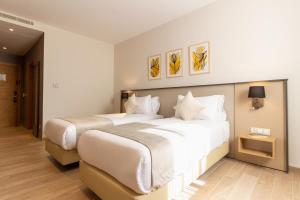 Golden Tulip Opera Algerにあるベッド