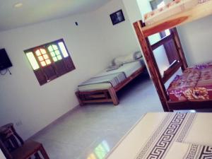 Postel nebo postele na pokoji v ubytování FÁTIMA REAL