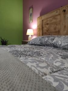 Postel nebo postele na pokoji v ubytování B&B Casa Caporali
