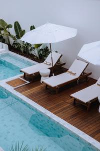 A piscina localizada em Olisa Hotel Boutique ou nos arredores