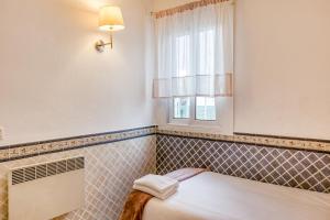A bed or beds in a room at Casa con vistas al Mar Costa Bra
