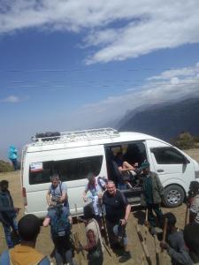 a group of people sitting in the back of a van at King Dawit Ethiopia Tours & Travel in Addis Ababa