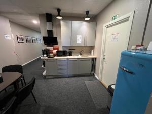 Kuchyň nebo kuchyňský kout v ubytování Allure Rooms & Coffee