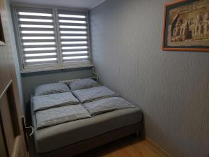 Posteľ alebo postele v izbe v ubytovaní Apartament 59 , ranczoturystyka Bielawa Sudety