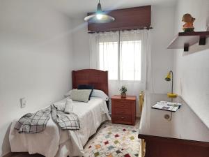 Postel nebo postele na pokoji v ubytování Céntrico Apartamento Jardines de Vallellano