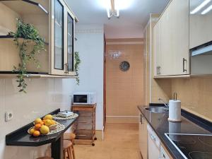 Kuchyň nebo kuchyňský kout v ubytování Céntrico Apartamento Jardines de Vallellano