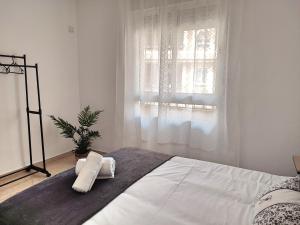 Postel nebo postele na pokoji v ubytování Céntrico Apartamento Jardines de Vallellano