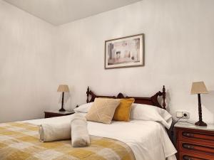 Postel nebo postele na pokoji v ubytování Céntrico Apartamento Jardines de Vallellano