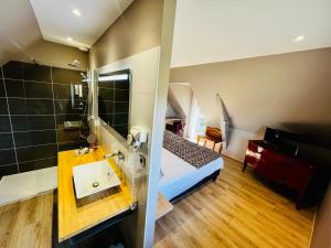 Hôtel Le Troubadour à Rocamadour客房内的一张或多张床位