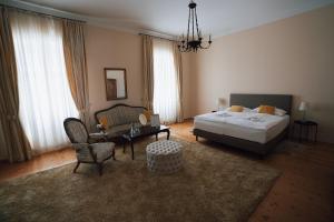 Postel nebo postele na pokoji v ubytování Schloss Gamlitz