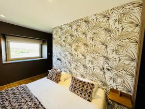 Hôtel Le Troubadour à Rocamadour客房内的一张或多张床位