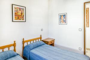 Posteľ alebo postele v izbe v ubytovaní Villa La Flor con piscina