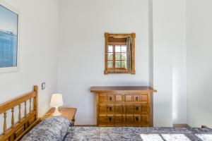 Posteľ alebo postele v izbe v ubytovaní Villa La Flor con piscina