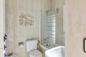 Kúpeľňa v ubytovaní Villa La Flor con piscina