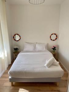 Кровать или кровати в номере A2G Nancy Thermal ARTEM