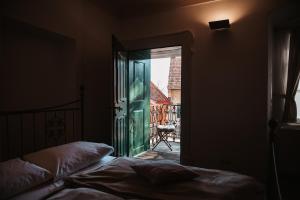 Postel nebo postele na pokoji v ubytování Schloss Gamlitz