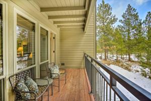 a porch of a house with chairs on it at Seventh Mountain Condo with Resort Amenities! in Bend