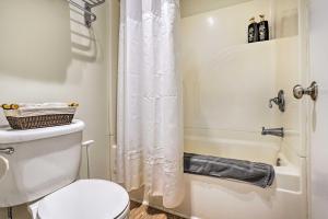 a bathroom with a toilet and a shower at Seventh Mountain Condo with Resort Amenities! in Bend