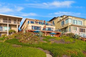 a large building on a hill with a yard at 3009 Ocean Street in Carlsbad