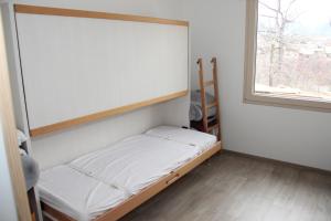 Posteľ alebo postele v izbe v ubytovaní ANCELLE TAILLAS RDC CHALET