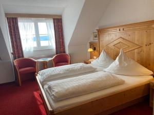 Postel nebo postele na pokoji v ubytování Seehotel Schäpfle