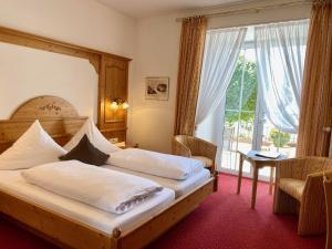 Postel nebo postele na pokoji v ubytování Seehotel Schäpfle