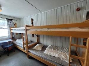 Postel nebo postele na pokoji v ubytování Soltun Soldatheim & Ungdomssenter