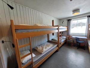 Postel nebo postele na pokoji v ubytování Soltun Soldatheim & Ungdomssenter