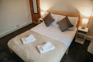 Säng eller sängar i ett rum på 63 Westmorland St by Prestige Properties SA