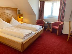 Postel nebo postele na pokoji v ubytování Seehotel Schäpfle