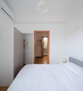 Кровать или кровати в номере Trastevere Heart Home