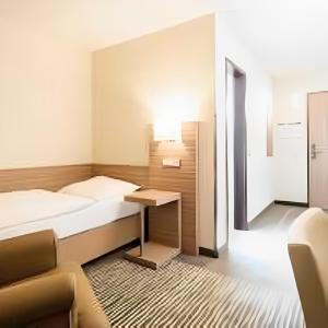 Letto o letti in una camera di Balland's Hotel & Restaurant
