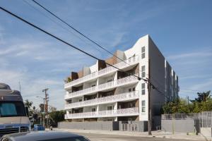 a white building with balconies on the side of it at Silverlake 1br w wd roof nr 5 10 freeways LAX-978 in Los Angeles