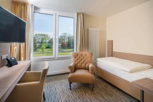 Letto o letti in una camera di Balland's Hotel & Restaurant