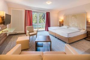 Letto o letti in una camera di Balland's Hotel & Restaurant