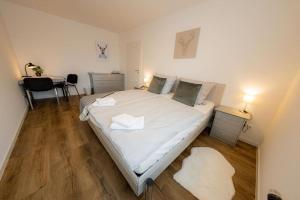Postel nebo postele na pokoji v ubytování Wohnung Hirschhöhe im Taunus