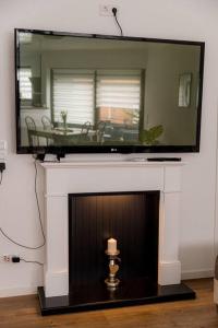 TV a/nebo společenská místnost v ubytování Wohnung Hirschhöhe im Taunus