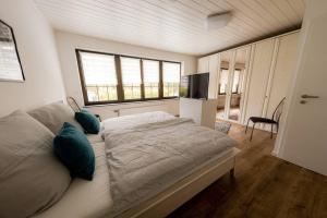 Postel nebo postele na pokoji v ubytování Wohnung Hirschhöhe im Taunus