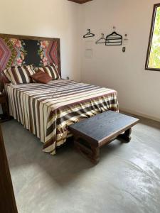 Voodi või voodid majutusasutuse Casa Rosada (3 suítes) toas