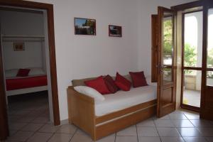 A bed or beds in a room at La Cecia - Casa vacanze nella campagna salentina