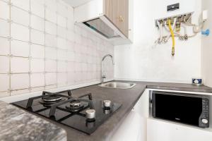 A kitchen or kitchenette at Grazioso