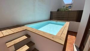 a swimming pool on top of a building at Cas Bunyoler in Cala Ratjada