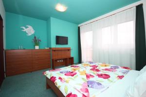 Voodi või voodid majutusasutuse Apartmány, Penzion, Wellness U zlaté rybky toas