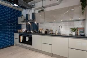 Virtuvė arba virtuvėlė apgyvendinimo įstaigoje Studios and Ensuite Bedrooms with Shared Kitchen at Riverside in Canterbury