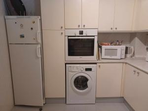 Kuchyň nebo kuchyňský kout v ubytování Las Velas 3 18 Fantástico apartamento con vistas