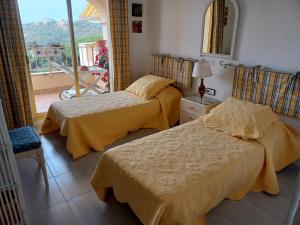 Postel nebo postele na pokoji v ubytování Las Velas 3 18 Fantástico apartamento con vistas